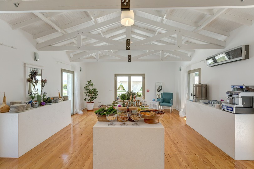 The bright breakfast room at Antmare Hotel
