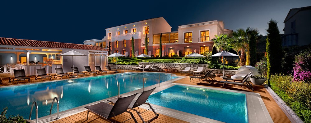 Antmare Hotel and pool at night