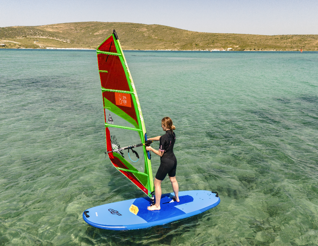 Learning to windsurf in the clear shallow water